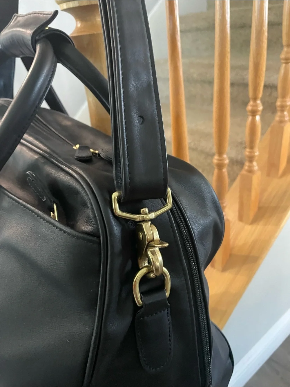 Coach Black Leather Duffel Bag with Gold Hardware